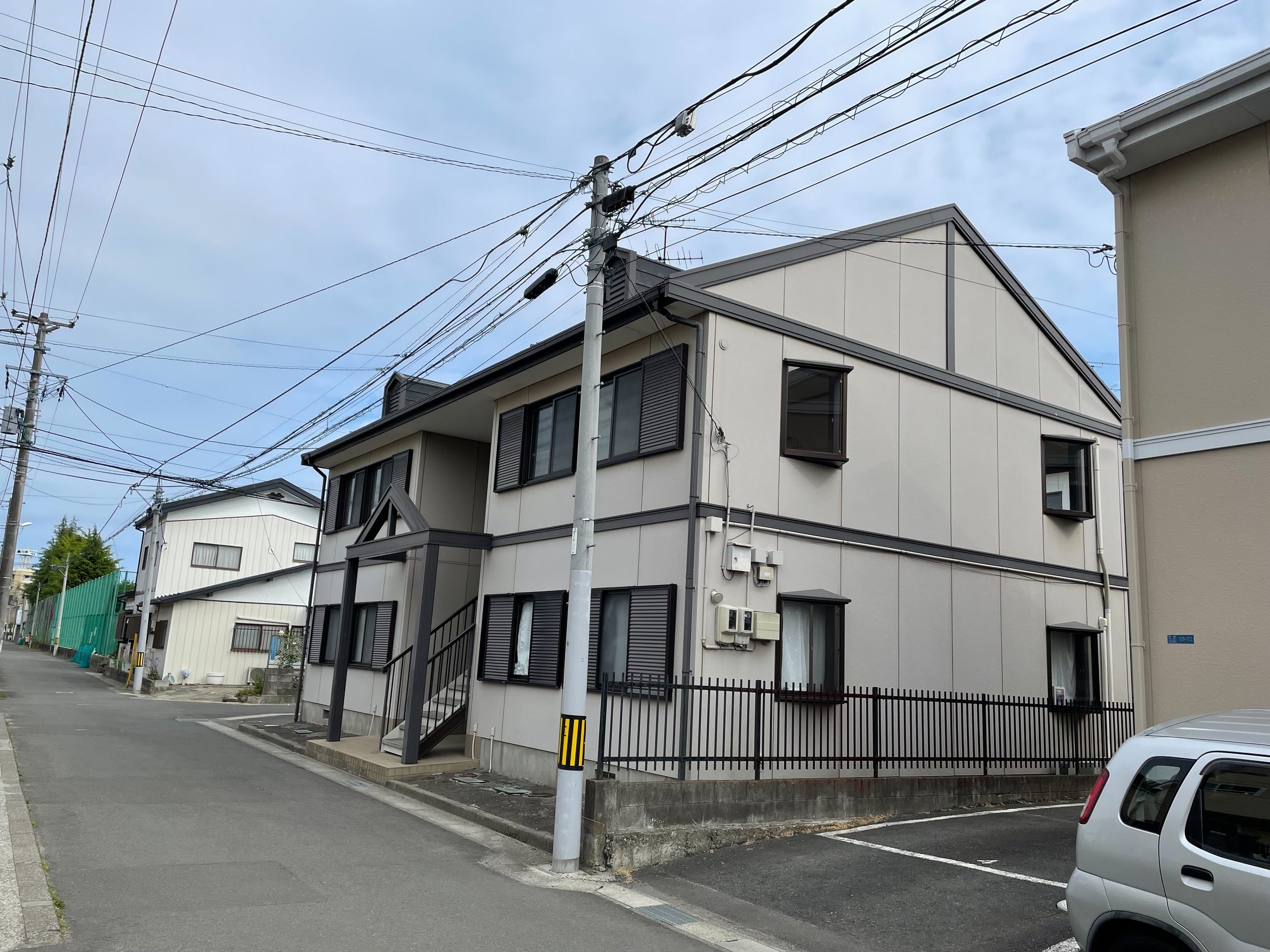 仙台市宮城野区I様所有アパートの側面塗装前(チョーキングが認められ、劣化が著しい)